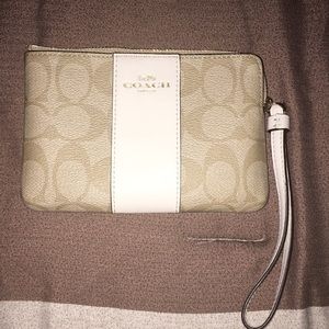 Coach single zipper wristlet.